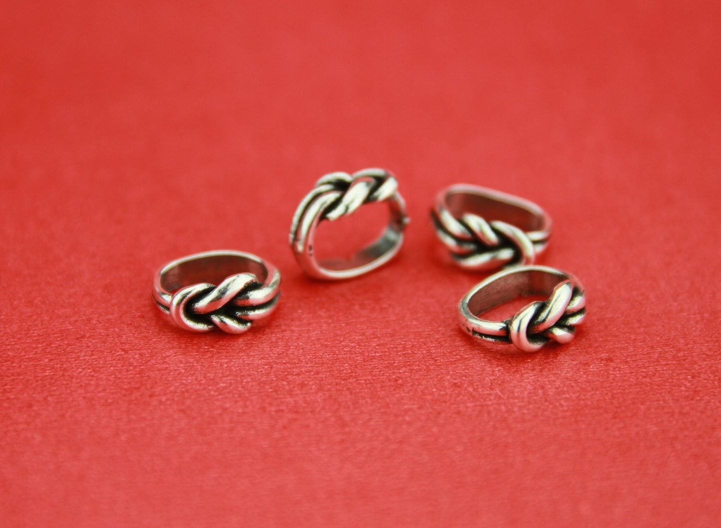 LS0064>>MADE IN EUROPE 4 licorice knot sliders, zamak knot sliders for licorice cord, Qty4