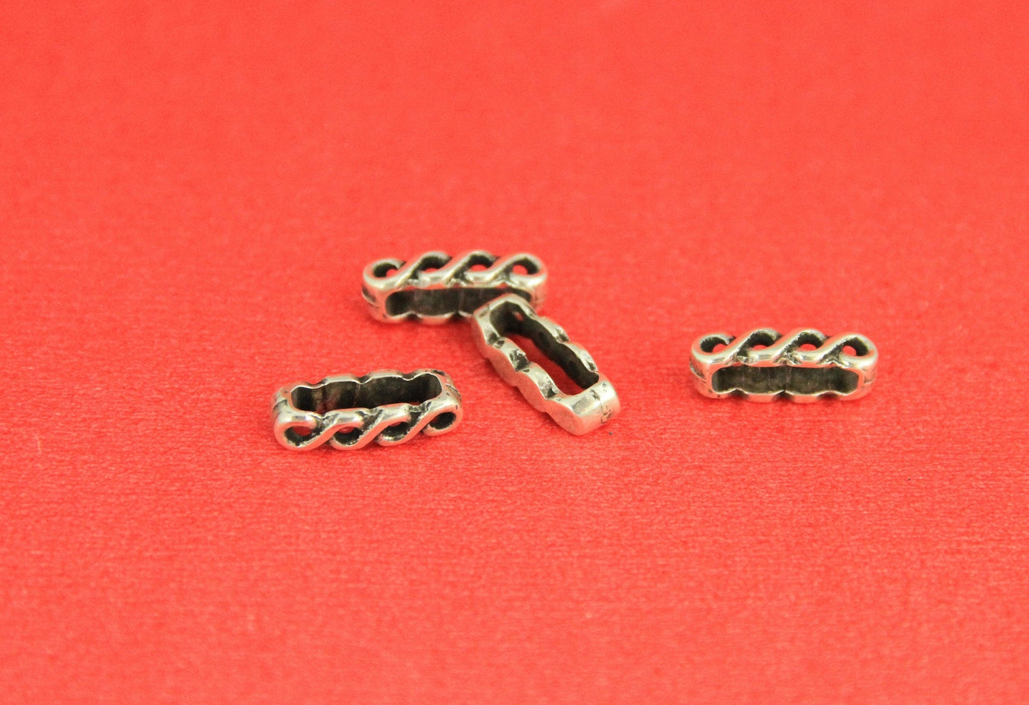 FS0357>>MADE IN EUROPE 4 zamak twisted sliders, 10mm flat cord sliders, Qty4